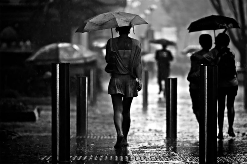 Rainy mood: a photographer from Singapore catches the emotions of people during a downpour