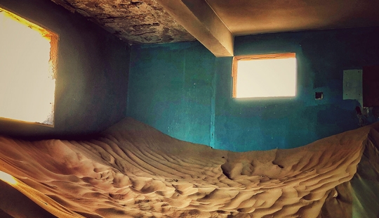 The abandoned ghost village of Al-Madam in the sands of the Emirates The abandoned ghost village of Al-Madam in the sands of the Emirates