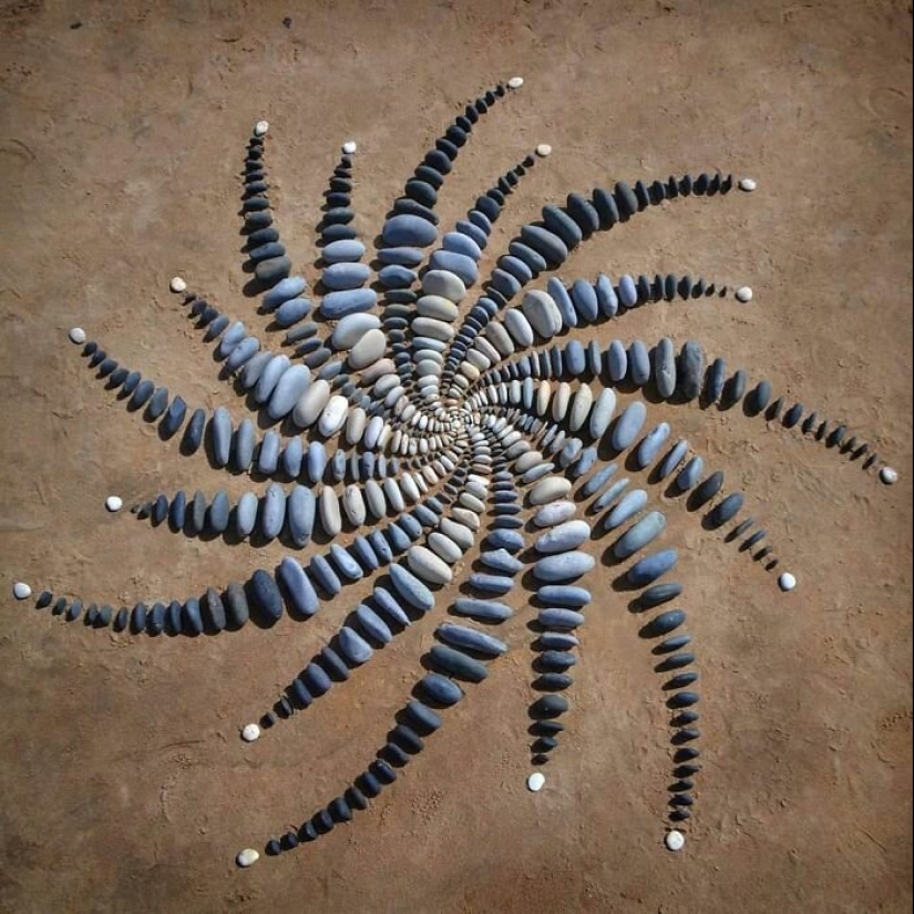 The artist creates the mood of their stunning works from the stones on the beach