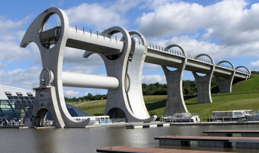 The Falkirk Wheel is a unique rotating structure that lifts entire ships