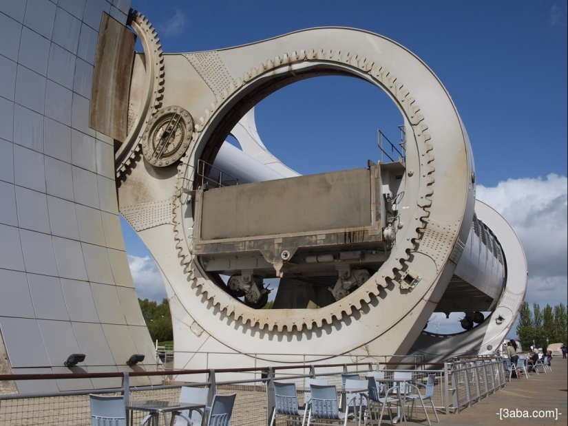 The Falkirk Wheel is a unique rotating structure that lifts entire ships