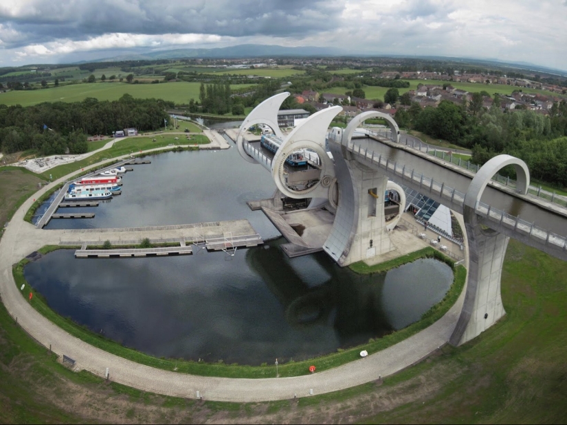The Falkirk Wheel is a unique rotating structure that lifts entire ships
