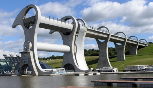 The Falkirk Wheel is a unique rotating structure that lifts entire ships The Falkirk Wheel is a unique rotating structure that lifts entire ships