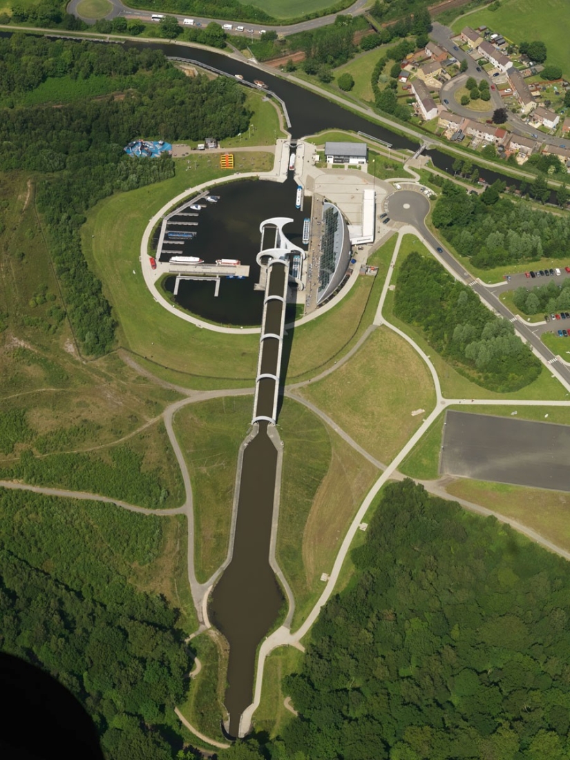 The Falkirk Wheel is a unique rotating structure that lifts entire ships