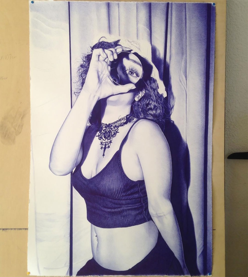 The superiority of blue: a young man writes fascinating pictures with a ballpoint pen The superiority of blue: a young man writes fascinating pictures with a ballpoint pen