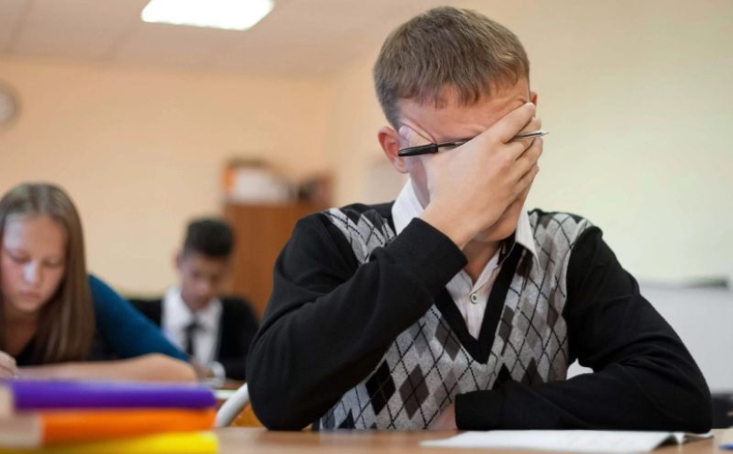 Why are grades lowered for students with last names?