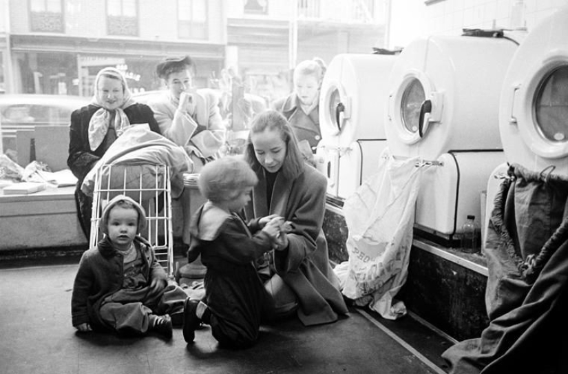 Why do Americans do laundry in laundries and not at home?