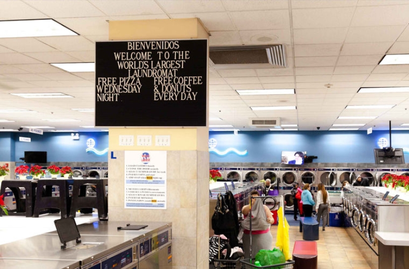 Why do Americans do laundry in laundries and not at home?