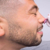 Why do cats lick people's faces Why do cats lick people's faces