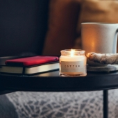 Why do cats throw objects off the table, and is it worth fighting it?