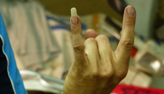 Why do men grow long nails on his pinky
