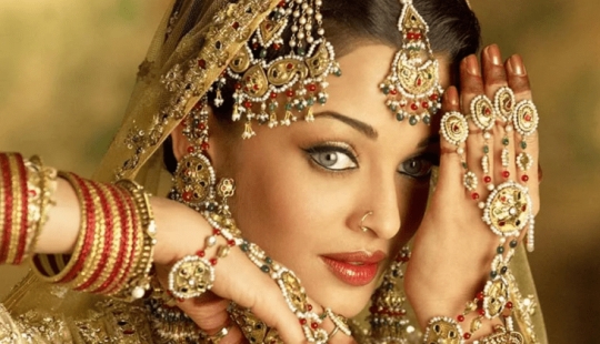 Why do the Indians have so much gold and what is the reason for its intense yellow color