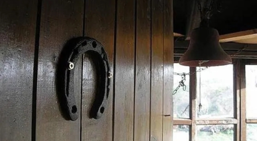 Why do they hang a horseshoe over the door for good luck Why do they hang a horseshoe over the door for good luck