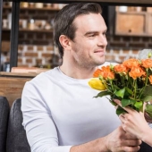 Why is it customary to give an odd number of flowers