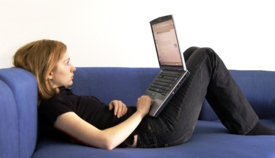 Why is it harmful to work at a laptop lying down Why is it harmful to work at a laptop lying down