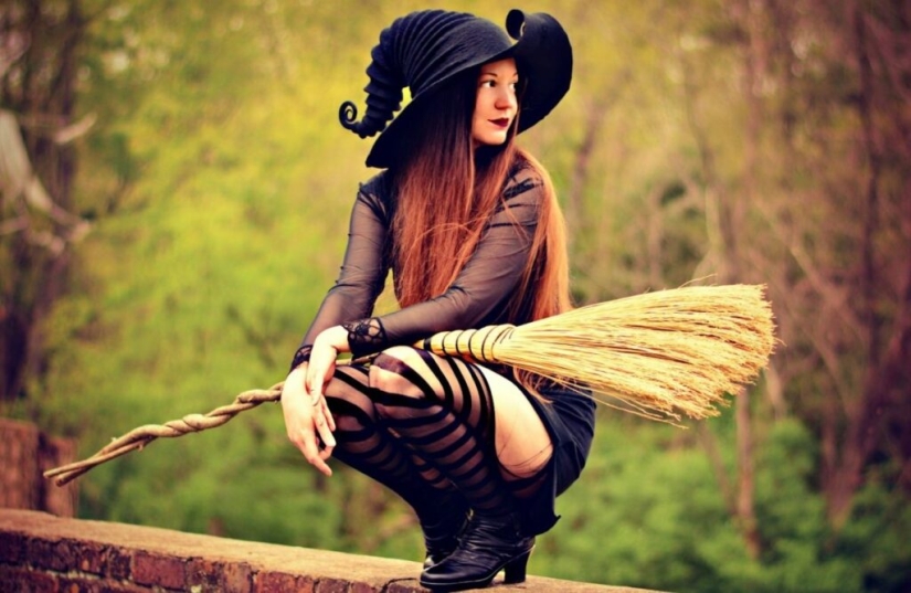 Why were witches depicted riding a broom?