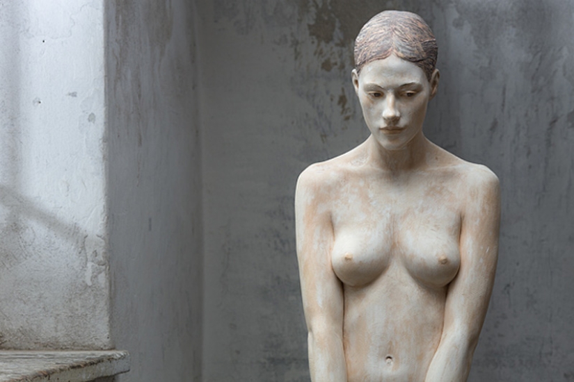 Youth captured in hyper-realistic wood sculptures